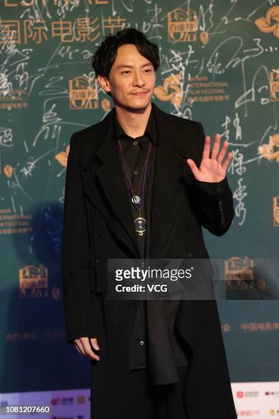 Actor Chang Chen poses on the red carpet during the opening ceremony of the 1st Hainan International Film Festival on December 11, 2018 in Sanya,...