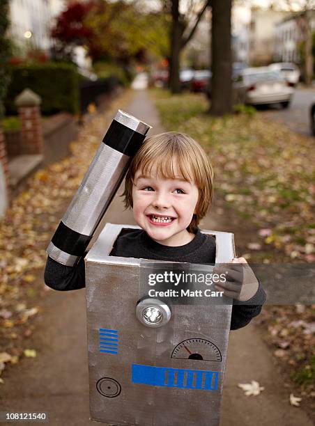 young boy in halloween costume - robot costume stock-fotos und bilder