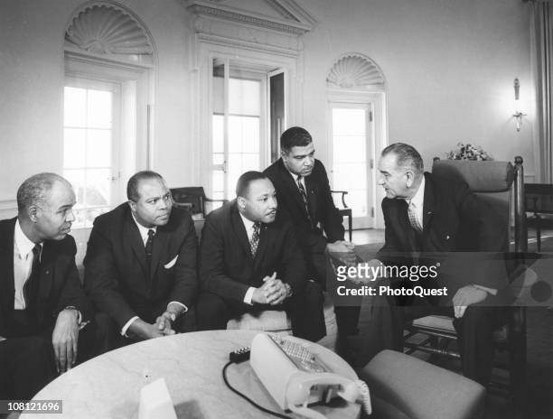 In the White House, US President Lyndon Johnson meets with Civil Rights leaders, from left, National Association for the Advancement of Colored...
