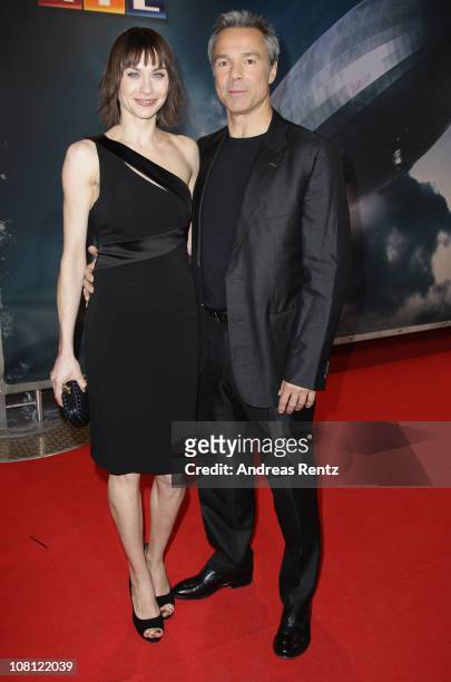 Actress Christiane Paul and actor Hannes Jaenicke arrive for the Hindenburg premiere at Kosmos theater on January 18, 2011 in Berlin, Germany.