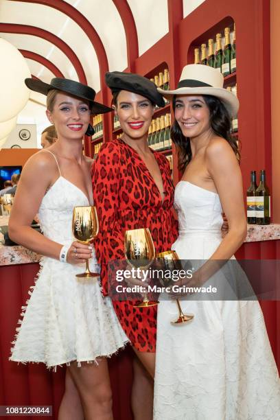 Rose McEvoy, Erin Holland and Abbey Gelmi attend the Moet Marquee Magic Millions Raceday at the Gold Coast Turf Clubon January 12, 2019 in Gold...