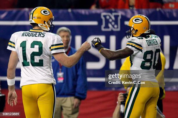 Aaron Rodgers and Donald Driver of the Green Bay Packers celebrate a play against the Atlanta Falcons during their 2011 NFC divisional playoff game...