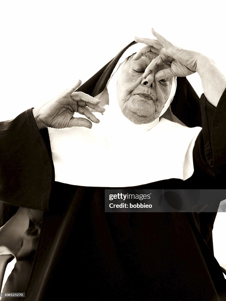 Senior Nun Pinching Nose Close, Sepia Toned