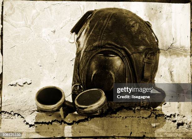 vintage aviator hat and flying goggles, grunge effect - aviation hat stock pictures, royalty-free photos & images