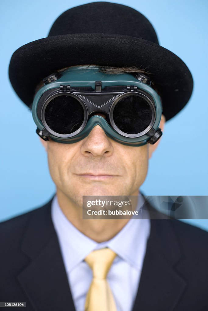 Businessman Wearing Bowler Hat and Flying Goggles