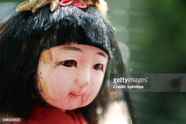 cracked antique porcelain china doll's head - chinese dolls stock pictures, royalty-free photos & images