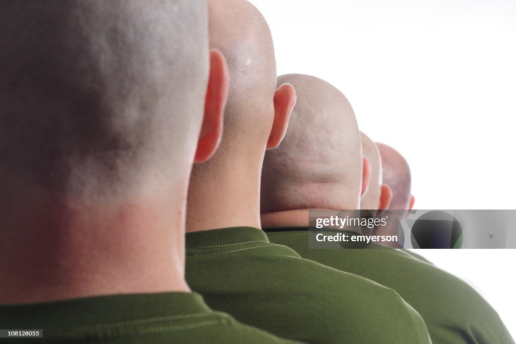 Line of Male Soldiers with Shaved Heads