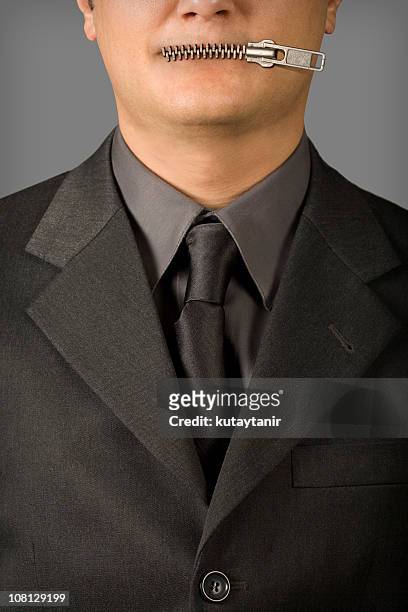 businessman's mouth with zipper - zipper stock pictures, royalty-free photos & images