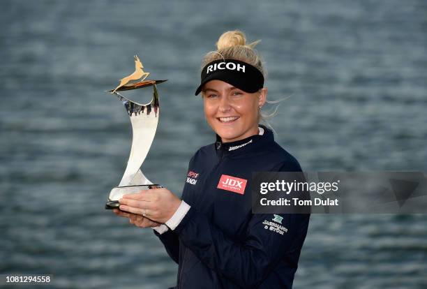 Charley Hull of England poses with the trophy after winning the Fatima Bint Mubarak Ladies Open at Saadiyat Beach Golf Club on January 12, 2019 in...