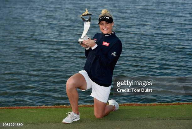 Charley Hull of England poses with the trophy after winning the Fatima Bint Mubarak Ladies Open at Saadiyat Beach Golf Club on January 12, 2019 in...