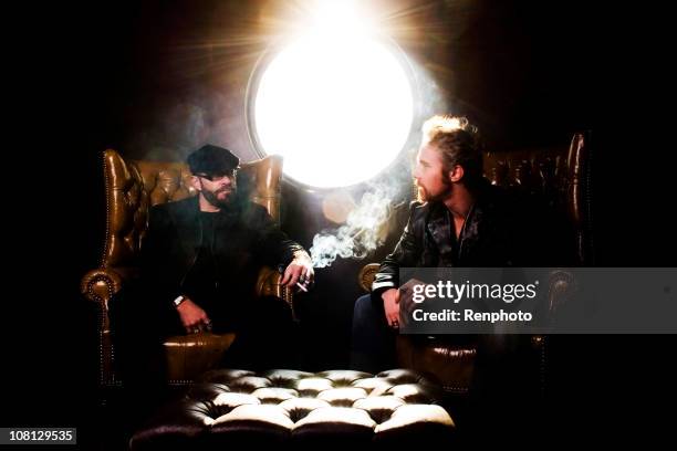 smoking in the vip room - rockabilly stock pictures, royalty-free photos & images