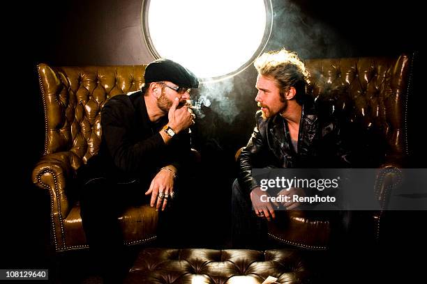 smoking in the vip room - vip room stock pictures, royalty-free photos & images