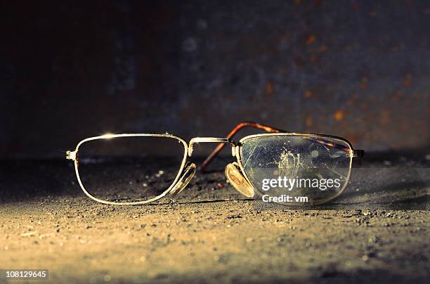 broken old-fashioned male glasses - broken spectacles stock pictures, royalty-free photos & images