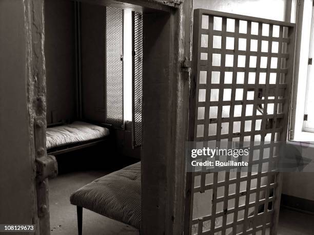 crime punishment - open prison cell stock pictures, royalty-free photos & images