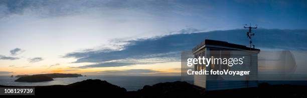 coastguard hut against sunset - weather station stock pictures, royalty-free photos & images