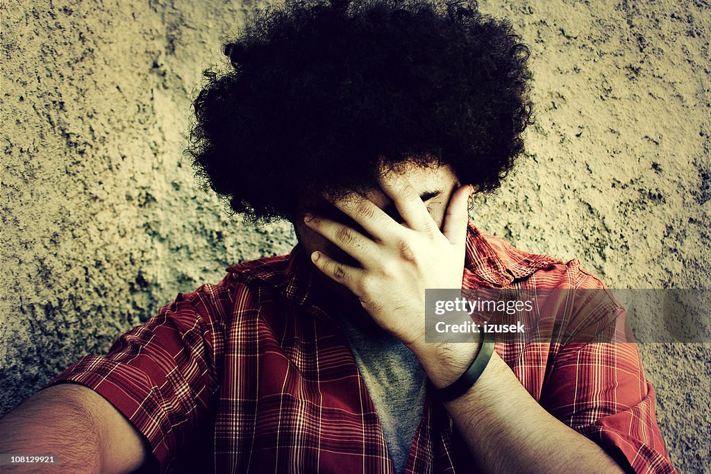 Resting Head Man Resting Head In Hands High-Res Stock Photo - Getty Images