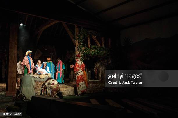 Actors take part in a dress rehearsal of the Wintershall Nativity play in the main barn on the Wintershall Estate on December 11, 2018 in Guildford,...