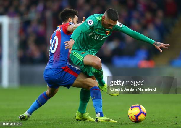 Jose Holebas of Watford is challenged by Andros Townsend of Crystal Palace during the Premier League match between Crystal Palace and Watford FC at...