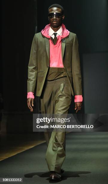 Model presents a creation for fashion house Les Hommes during the Men's Fall/Winter 2019/20 fashion shows in Milan, on January 12, 2019.