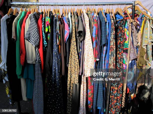 a variety of clothes for sale - kleiderstange stock-fotos und bilder