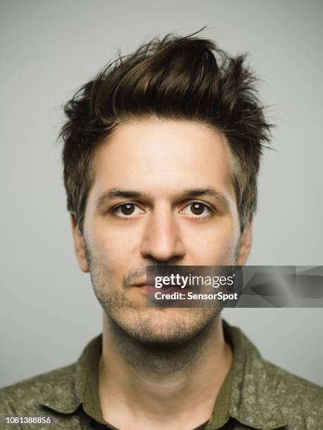 real caucasian man with blank expression - pompadour stock pictures, royalty-free photos & images