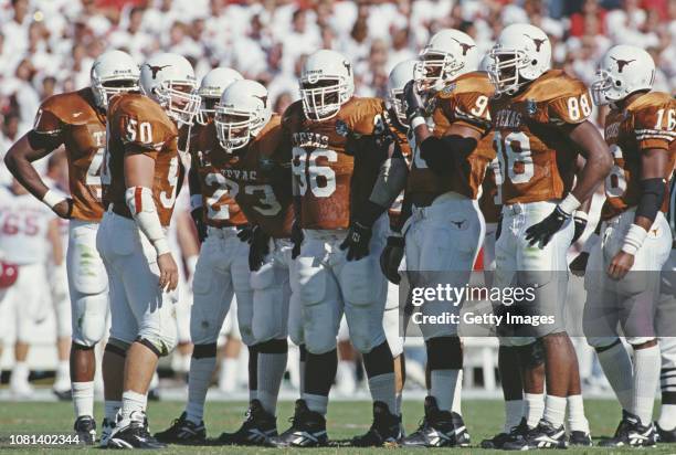 Tyson King addresses the University of Texas Longhorns defence in the huddle during a NCAA Southwest Conference college football game against the...