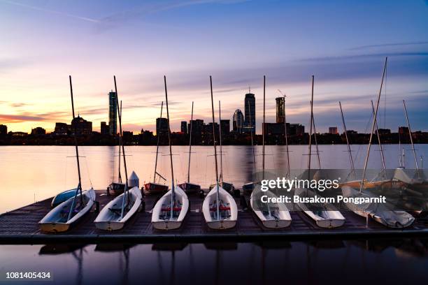 boston skyline from across the charles river at sunlight - charles river stock pictures, royalty-free photos & images