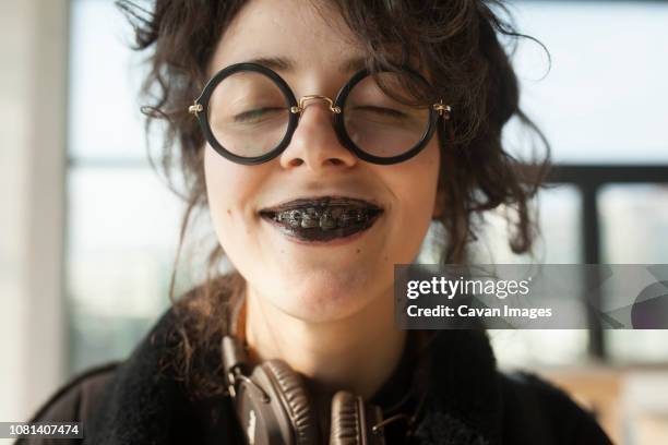 close-up of woman with messy mouth eating ice cream at home - woman mouth stock pictures, royalty-free photos & images