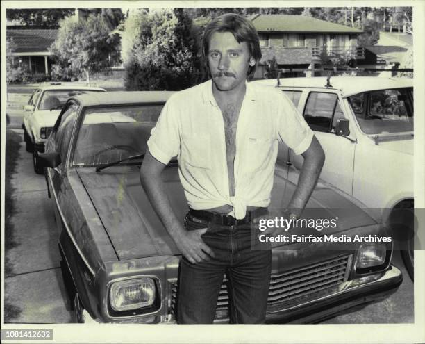 Peter Tall of Northmead, standing next to his car which was wired with a bomb.Family Court Bombs - A bomb discovered in a car at a house in Northmead...