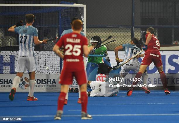 Harry Martin of England scores his team's third goal during the FIH Men's Hockey World Cup quarter final match between Argentina and England at...