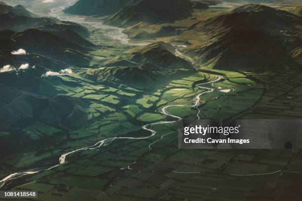 aerial view of green landscape - new zealand aerial stock pictures, royalty-free photos & images
