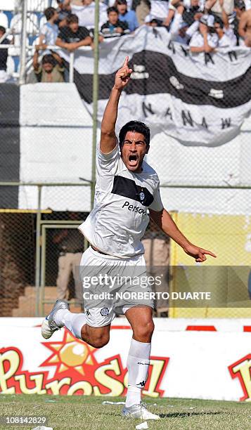 Juan Carlos Ferreyra, player of Olimpia, celebrates after scoring against Cerro Porteno during the Paraguayan derby on October 31, 2010 at the...