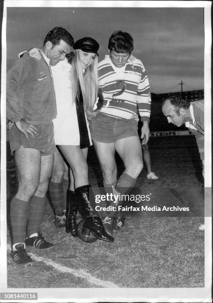 Miss World and Footballers -- Miss World, Eva Rueber-Staier, met members of the South Sydney rl.team at training late today.Here Miss World packs...