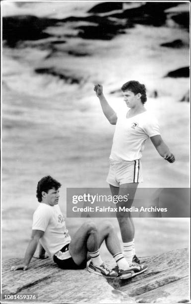 Cronulla Players, Andrew Ettingshausen &amp; Mark McGwa relax on the picturesque Cliffs at Coogee after a vigorous workout with the Kangaroo Train on...
