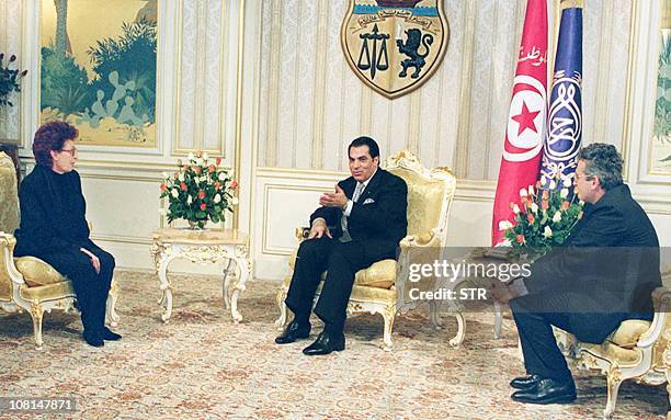 Tunisian President Zine El Abdine Ben Ali confers with former Italian Socialist leader Bettino Craxi's widow Anna and his son Bobo during their...