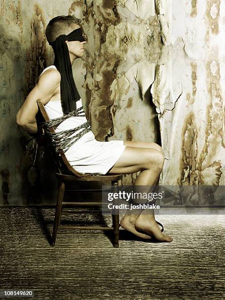 blindfolded man sitting in chair - boxer bildbanksfoton och bilder