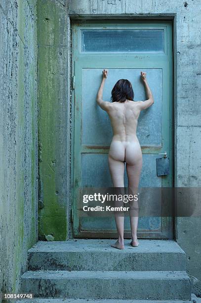 naked woman banging on door - knock stock pictures, royalty-free photos & images