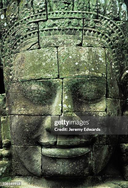 giant gesicht im bayon-tempel, angkor wat, kambodscha - angkor wat stock-fotos und bilder