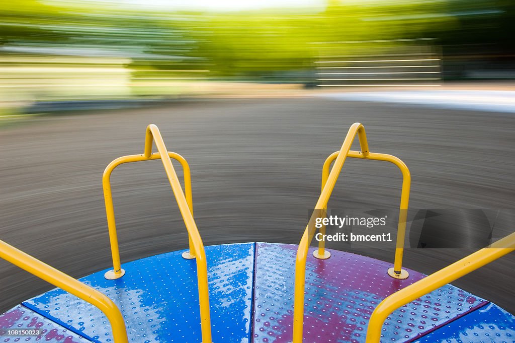 Merry Go-Round Spinning, Motion Blur of Background