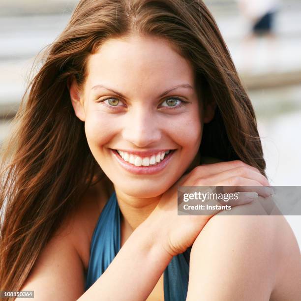 portrait of young woman smiling - hazel eyes stock pictures, royalty-free photos & images