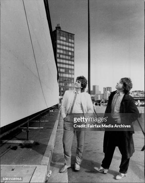 Rodney Monk and David Humphries at the Opera house next to the white board which is were they will co-ordinate the painting of a mural. July 7, 1983....