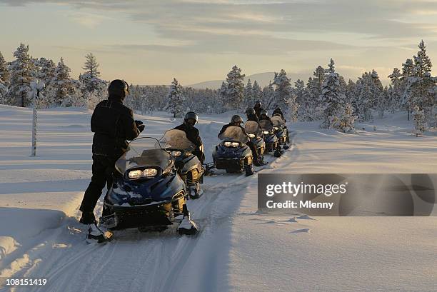 snowmobile expedition winter - snow vehicle stock pictures, royalty-free photos & images