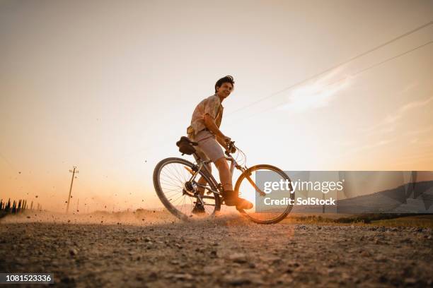 tearin' up a dirt road in italy - sked stock pictures, royalty-free photos & images