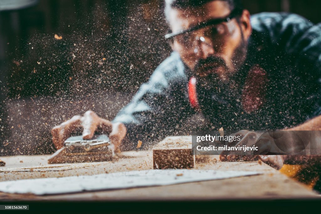 Young handosme carpenter