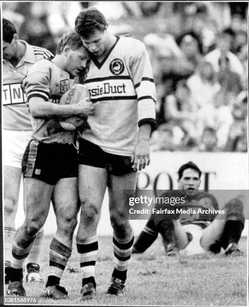 There, there, Barry.... Consoling words from Andrew Ettingshausen to Cronulla teammate Barry Russell? No way. Russell had just scored what turned out...
