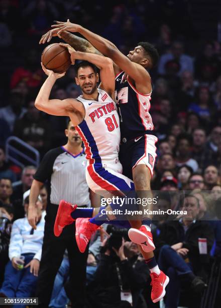 Tyrone Wallace of the Los Angeles Clippers defends Jose Calderon of the Detroit Pistons as he tries to make a pass in the first half of the game at...