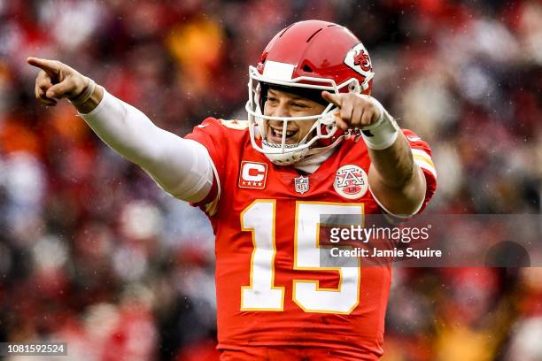 Patrick Mahomes of the Kansas City Chiefs points to the sidelines in celebration after throwing a touchdown against the Kansas City Chiefs during the...