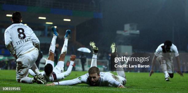 Adam Nemec of Kaiserslautern celebrates with team mates after winning the DFB Cup round of sixteen match between TuS Koblenz and 1. FC Kaiserslautern...