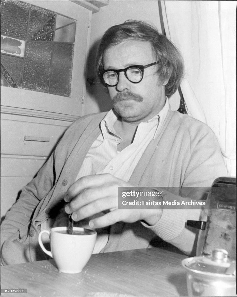 Mr. Peter Kocan photographed in his flat in Balfour Road, Kensington this morning.Peter Kocan, the man who shot Arthur Calwell in 1966, denied he was trying to "glorify" violence in a recent magazine article.“The article is intended to be a sobei and