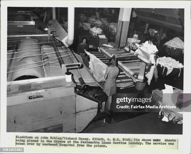 Sheets being placed in the dryers at the Parramatta Linen Service laundry. The service was taken over by Westmead Hospital from the prison. June 28,...